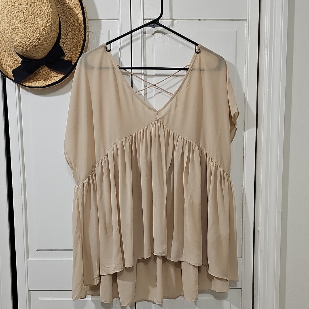 Umgee Beige V-Neck Blouse with Crisscross Detail At The Back.